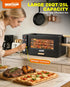 WantJoin 26QT countertop rotisserie oven with simple controls cooking meat skewers in a home kitchen